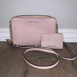 SOLD Michael Kors pink crossbody with baby wallet.